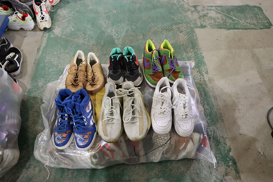 Elevate your product line with top-grade used men's sport shoes from Hissenshoes