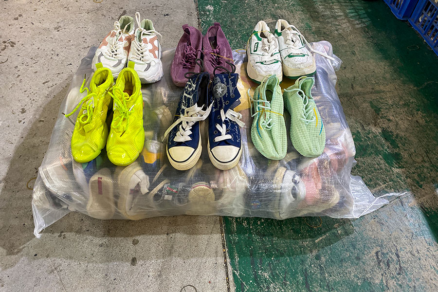 six pairs of mixed used shoe pairs to give clients an idea of what they'll recieve